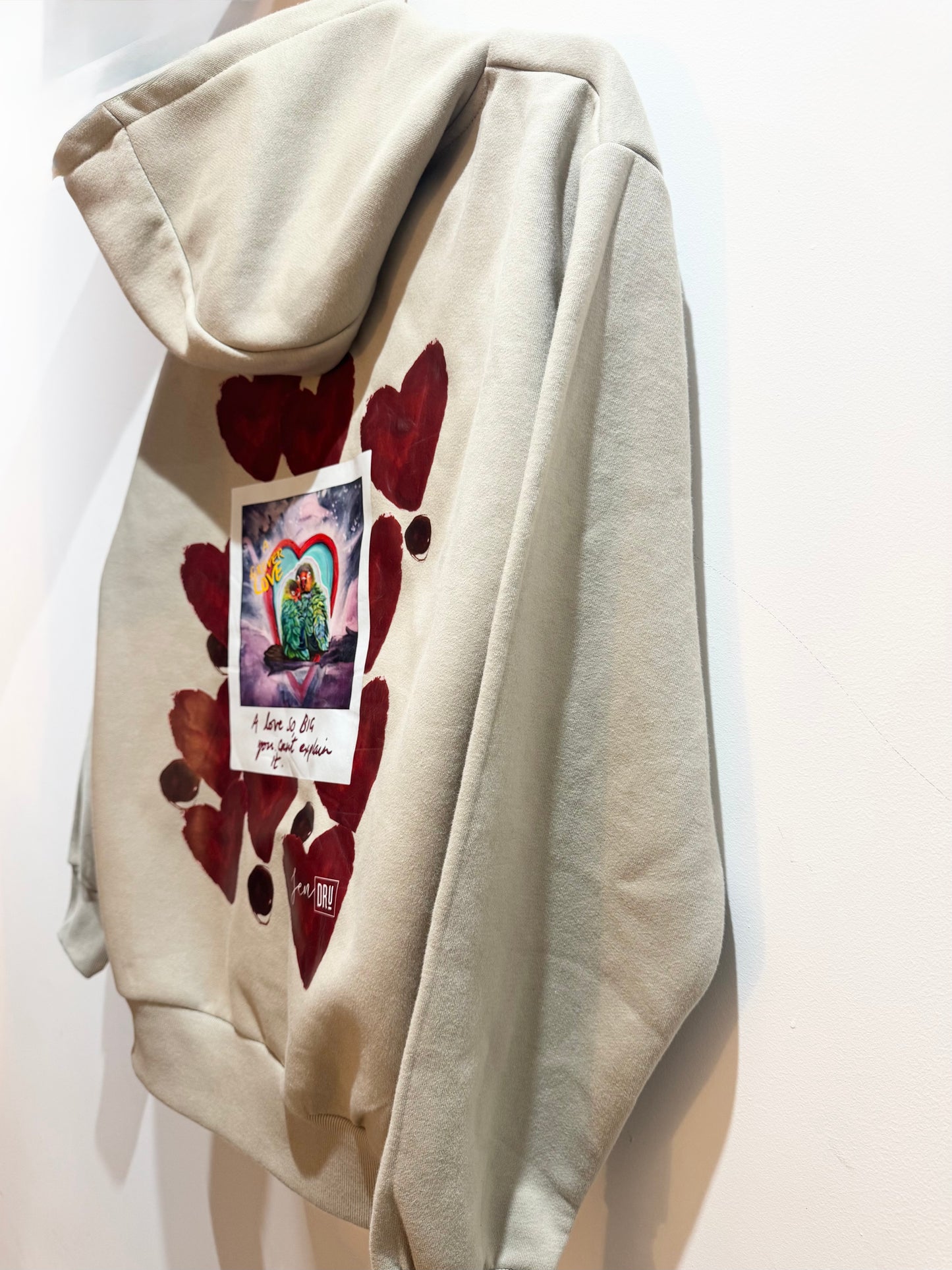 "A love so big you can't explain it" Taupe oversized hoodie.